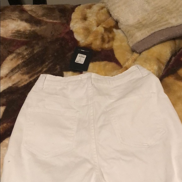 Unworn white cut up jeans from fashion nova. - Picture 5 of 5